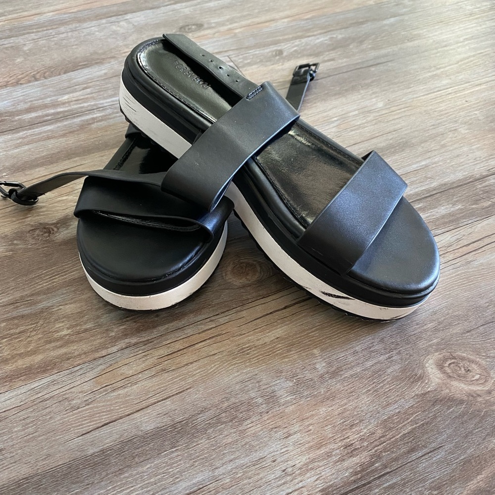 Black and white platform sandals